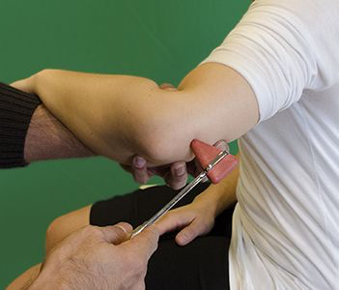 <p>The results of the test shown in the photograph reveal asymmetrical hyporeflexia. The patient is MOST likely to have difficulty with which of the following tasks?</p><p>1. Reaching across the body to grab a seat belt</p><p>2. Opening a jar</p><p>3. Pushing off the armrest of a chair during a sit-to-stand transfer</p><p>4. Carrying a laundry basket at waist height</p>