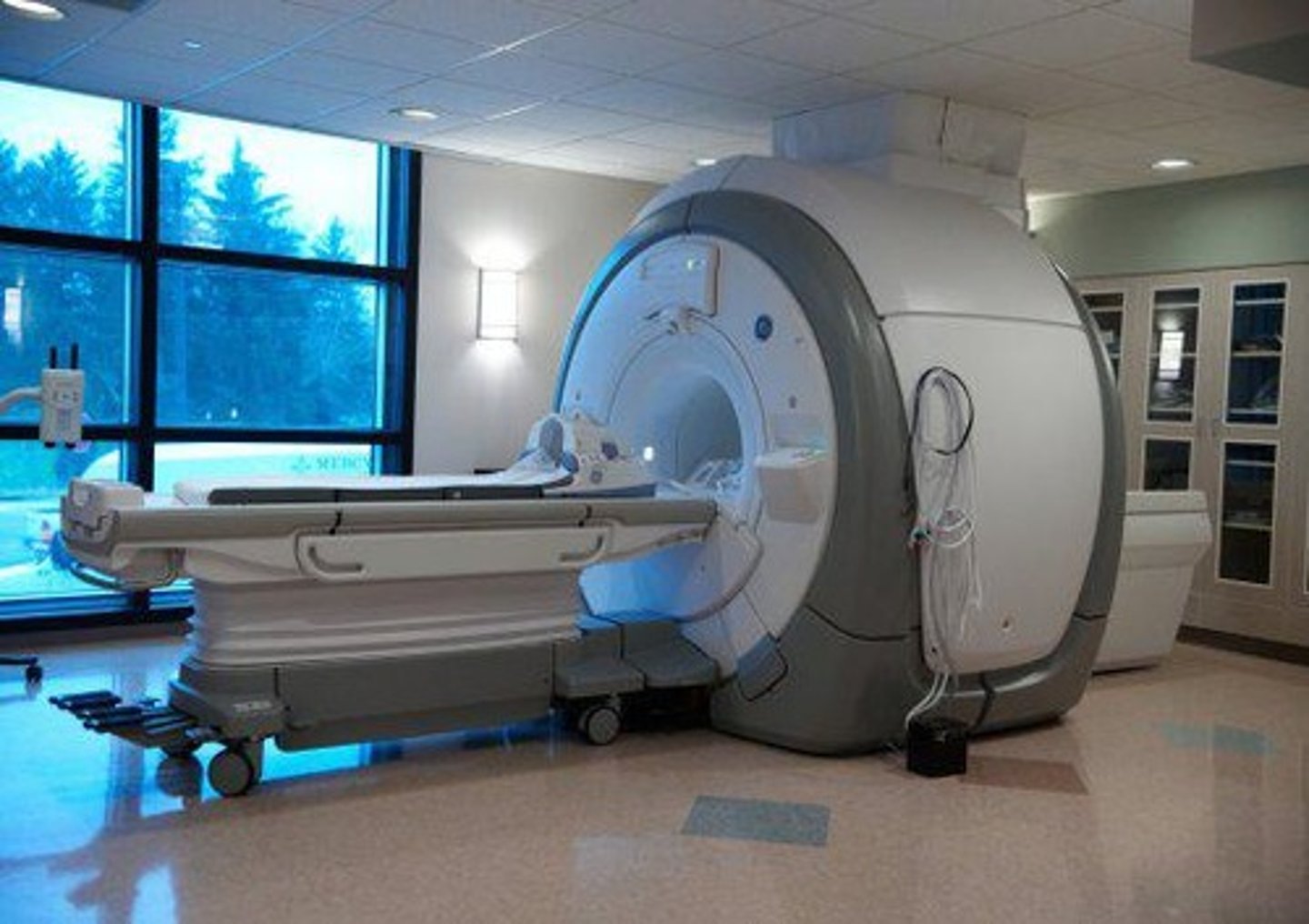 <p>MRI uses a magnetic field to generate images instead of radiation.</p>