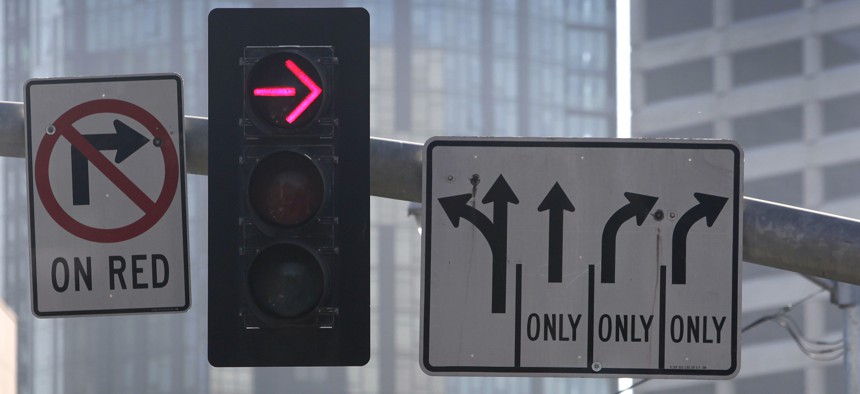 <p><span><span>At intersections with a "No Turn On Red" sign, you must:</span></span></p>