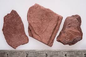 <p>-metamorphic </p><p>-foliated</p><p>-slaty</p><p>-red slate</p><p>proliths: shale or mudstone</p><p>-regional metamorphism - low&gt;med&gt;high grade </p><p><span>uses: construction </span></p>