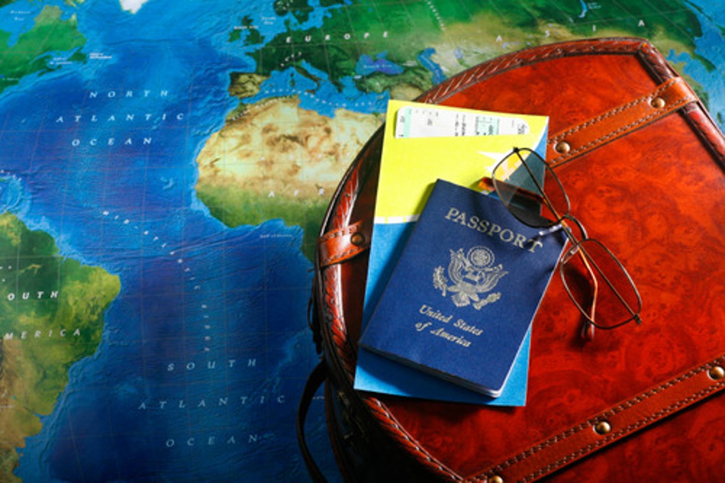 <p>abroad, outside the country</p>