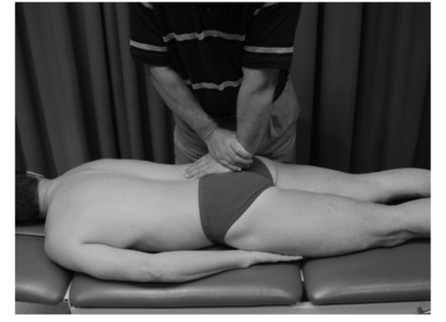 <p>Also called Prone Springing &amp; Sacral apex pressure</p><p>___Pt is prone</p><p>___Examiner puts base of their hand on the center of sacrum and applies a P-A force</p><p>___Positive finding: pain over the SIJ</p><p>___Indication: SIJ syndrome</p>