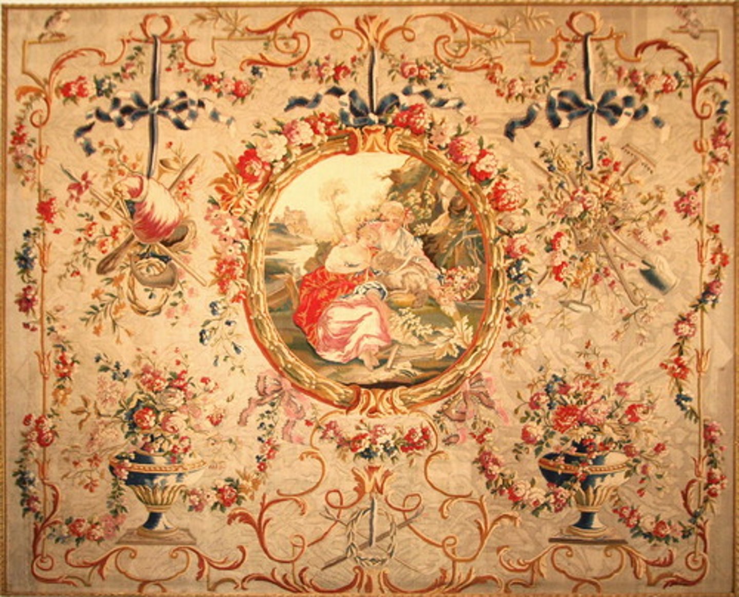 <p>French handmade area rugs and tapestries used for wall hangings, featuring figures and scenic landscape, named after the village in France where they originated</p>