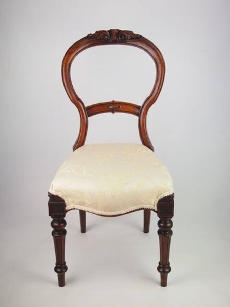<p>A rounded back Hepplewhite style chair in the shape of a hot-air balloon.</p>