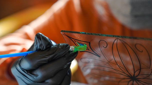 <p>Reverse painting technique</p>