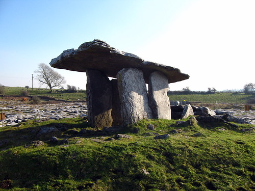 <p>A prehistoric monument consisting of two or more large upright stones supporting a horizontal stone slab or capstone.</p>