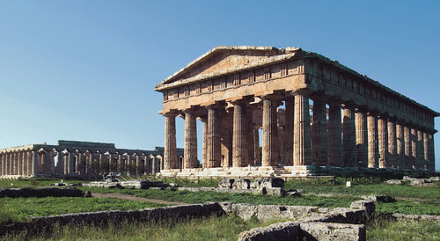 <p>Who: Paestum was founded by colonists from Sybaris and/or Troezen1.</p><p>What: Paestum is an ancient Greek city known for its three well-preserved Greek temples in the Doric order1. The city walls and amphitheatre are largely intact, and the remains of many other structures, as well as paved roads, can still be seen1. There is also a small circular council hall (bouleuterion) or assembly space (ekklesiasterion), with seats in tiers23.</p><p>Where: Paestum is located on the coast of the Tyrrhenian Sea in Magna Graecia1. It now lies in the comune of Castelvetrano, between the frazioni of Triscina di Selinunte in the west and Marinella di Selinunte in the east1.</p><p>When: Paestum was founded around 600 BC1. It was abandoned in the Early Middle Ages, and left undisturbed and largely forgotten until the eighteenth century1.</p><p>Why it's interesting and important: Paestum is significant because it provides valuable insights into the history, culture, and architecture of ancient Greece. The city got its name from the wild celery that grew on the spot4. The archaeological site contains many great temples, with five centered on an acropolis1. At its peak before 409 BC, the city may have had 30,000 inhabitants, excluding slaves1.</p>