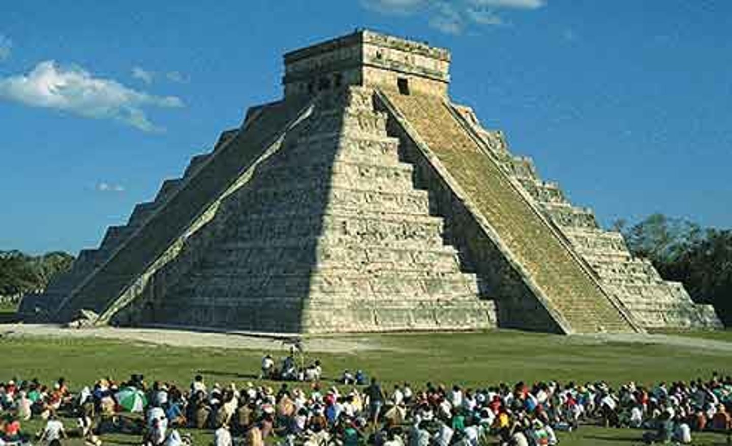 <p>a structure with a flat base and sides shaped like triangles; Maya temples were built on top of these</p>