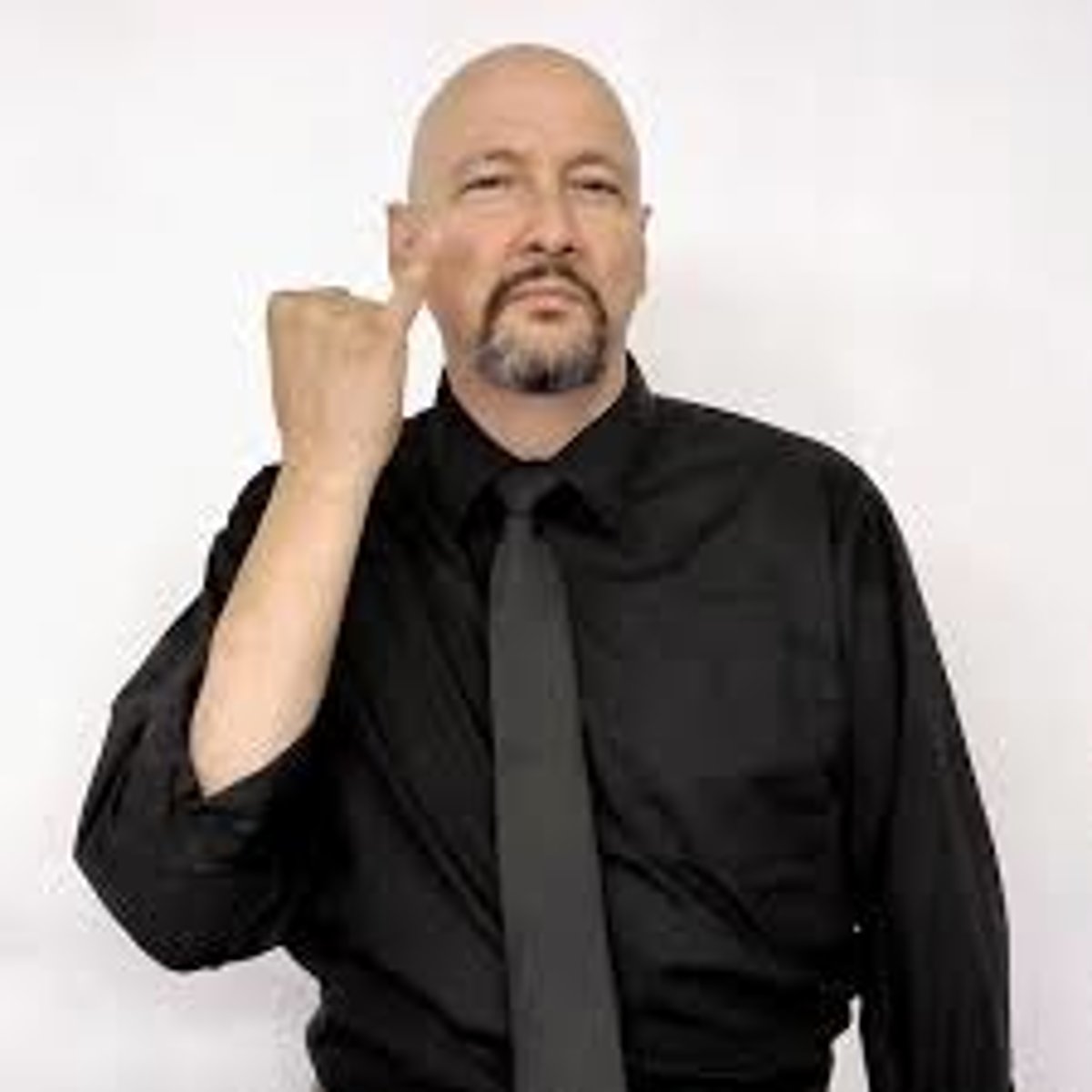 <p>With the hand closed, pinky finger extended, tap the pinky finger twice at the outer corner of the eye.</p>