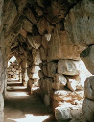 Constructed of overlapping stone courses T