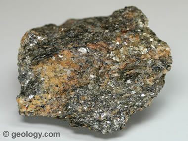 <p><span style="font-family: sans-serif">Metamorphic rock: schist</span></p><p><strong>Schist is a medium-grained foliated metamorphic rock primarily made of platy minerals like biotite, muscovite, talc, and chlorite, with smaller amounts of bulky minerals like quartz and feldspar. The platy minerals are oriented parallel to one another, making it easy to break the rock into thin plates.</strong></p><p><br><strong>Schist has large, flattened grains of platy minerals like muscovite, biotite, and chlorite. These crystals are elongated and oriented roughly parallel to one another. Quartz and feldspar are often present and may or may not be elongated. Larger crystals of bulky minerals like garnet are commonly included.</strong></p><p><br></p>