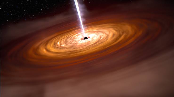<p><span>C. A bright, active galactic nucleus</span></p><p><span>Powered by a supermassive black hole eating matter rapidly.</span></p>