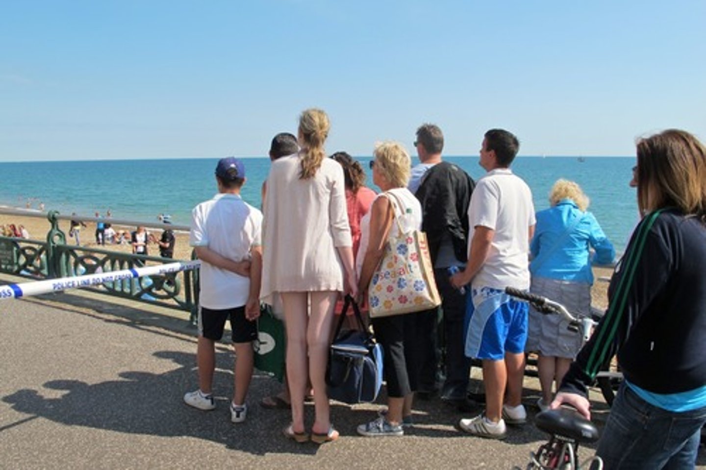 <p>a person who is present at an event or incident but does not take part.</p>