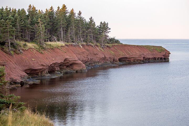 <p>The wearing away and removal of rock</p><p>Eroded sediment is transported by wind, water or ice.</p>