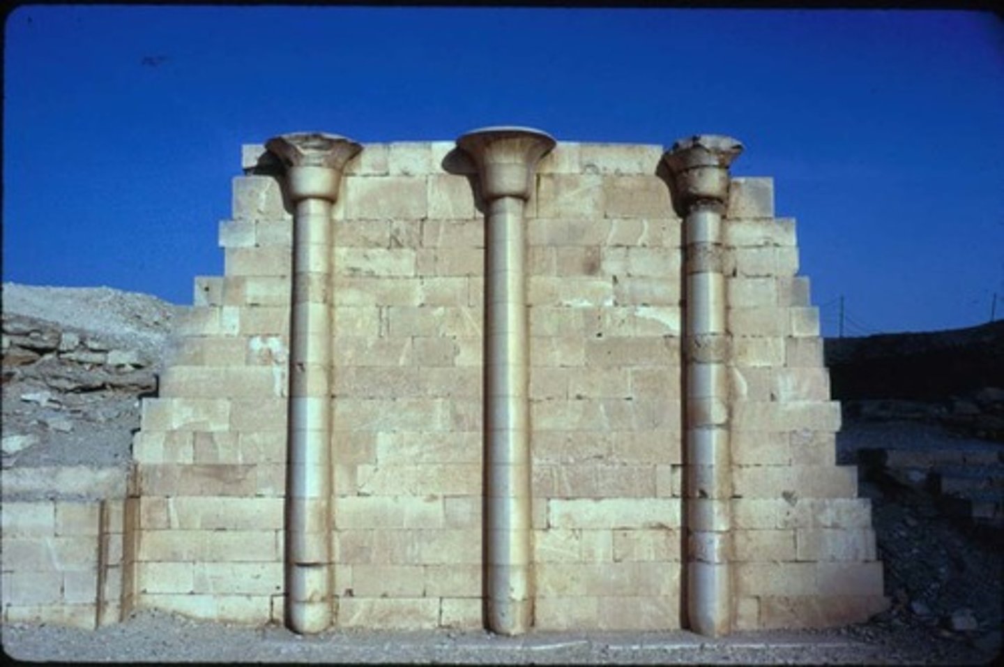 <p>-column that is partially or almost fully integrated into the wall</p><p>-findings of papyrus columns in House of North of Djoser's funerary complex</p>