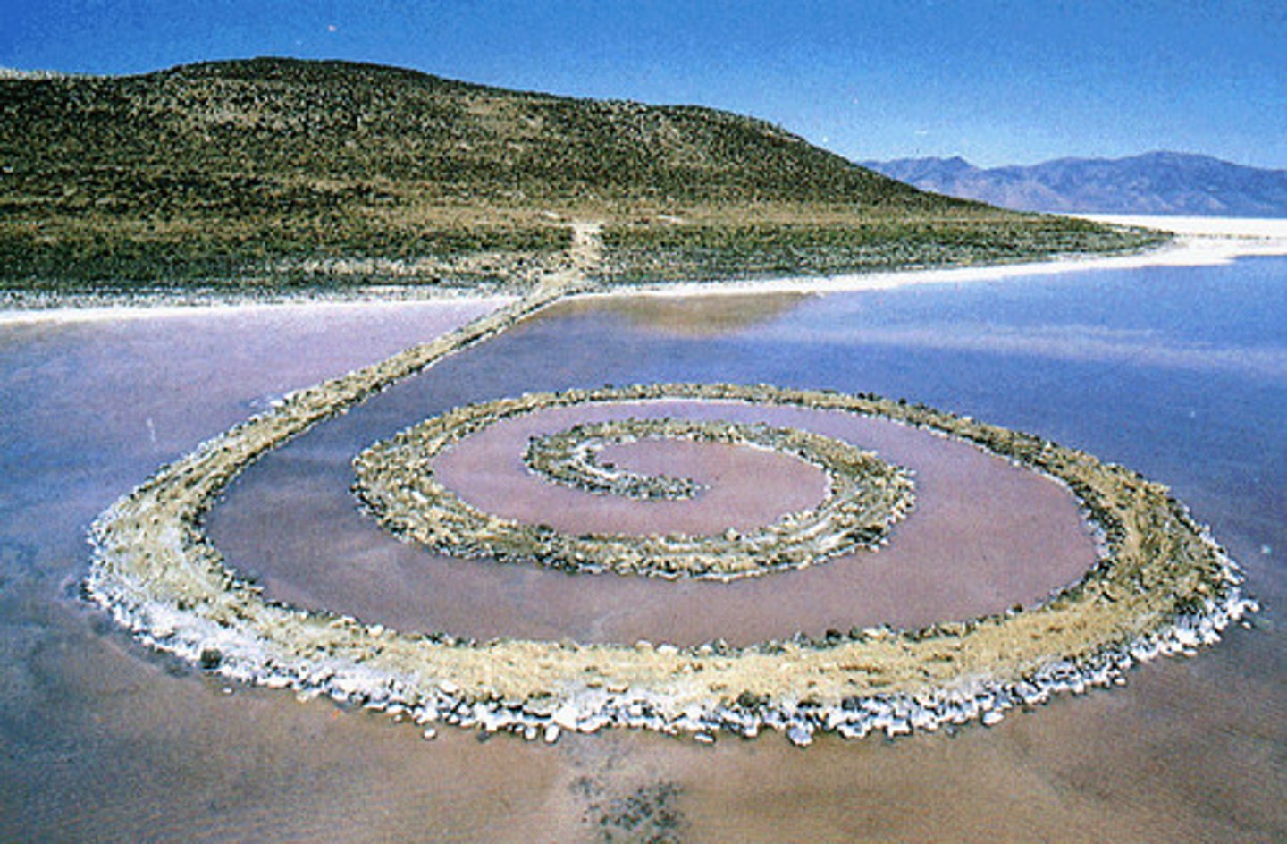 <p>Robert smithson, ancient symbol not always visible always changing color</p>