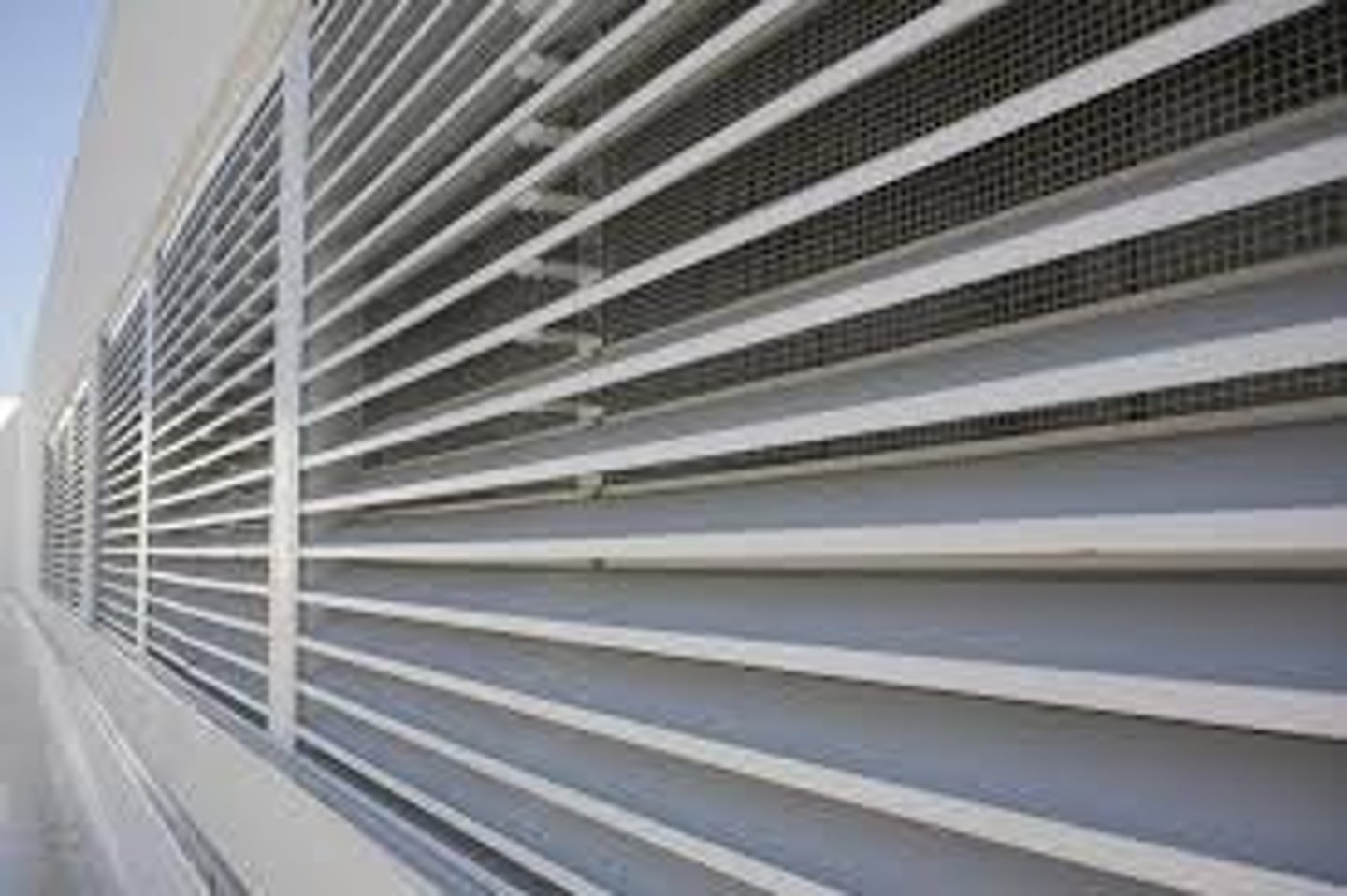 <p>Panels or angled blades used in windows, facades, or light fixtures to control the amount and direction of light, air, or visibility passing through an opening. Allow ventilation or daylight, reducing glare, direct sun, or rain.</p>