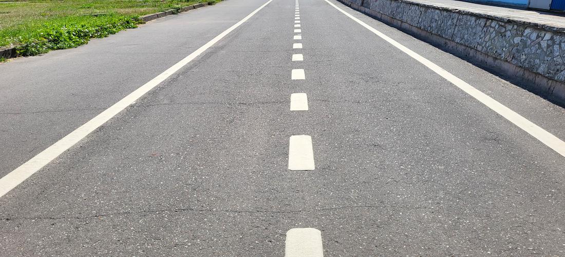 <p><strong>What do broken white lines separate?</strong><br><span>A) Oncoming traffic</span><br><span>B) Pedestrian paths</span><br><span>C) a pedestrian crosswalk</span><br><span>D) Lanes going in the same direction</span></p>