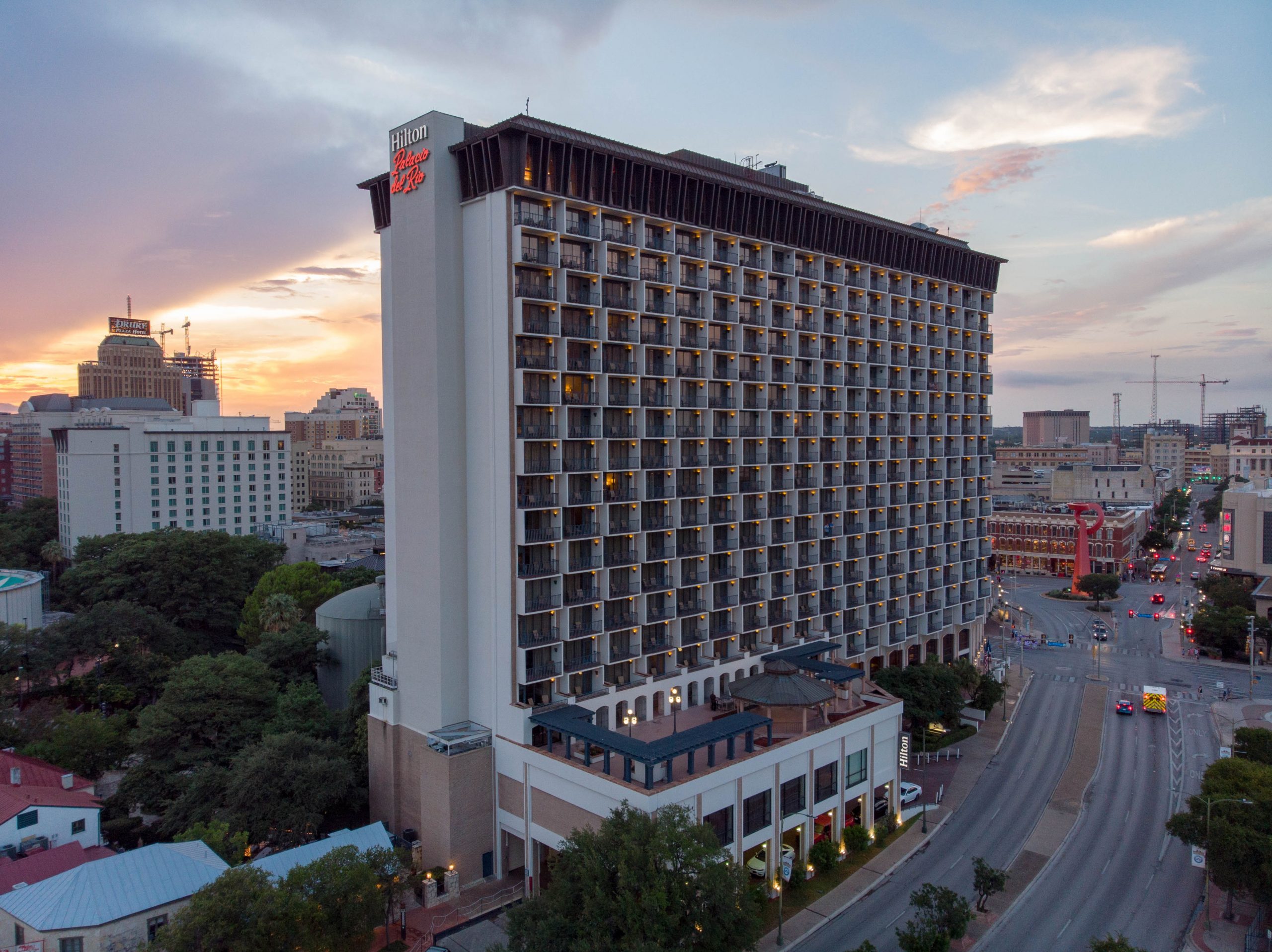 <p>built rooms offsite to save time (prefabricated), rooms stacked on top of each other</p>