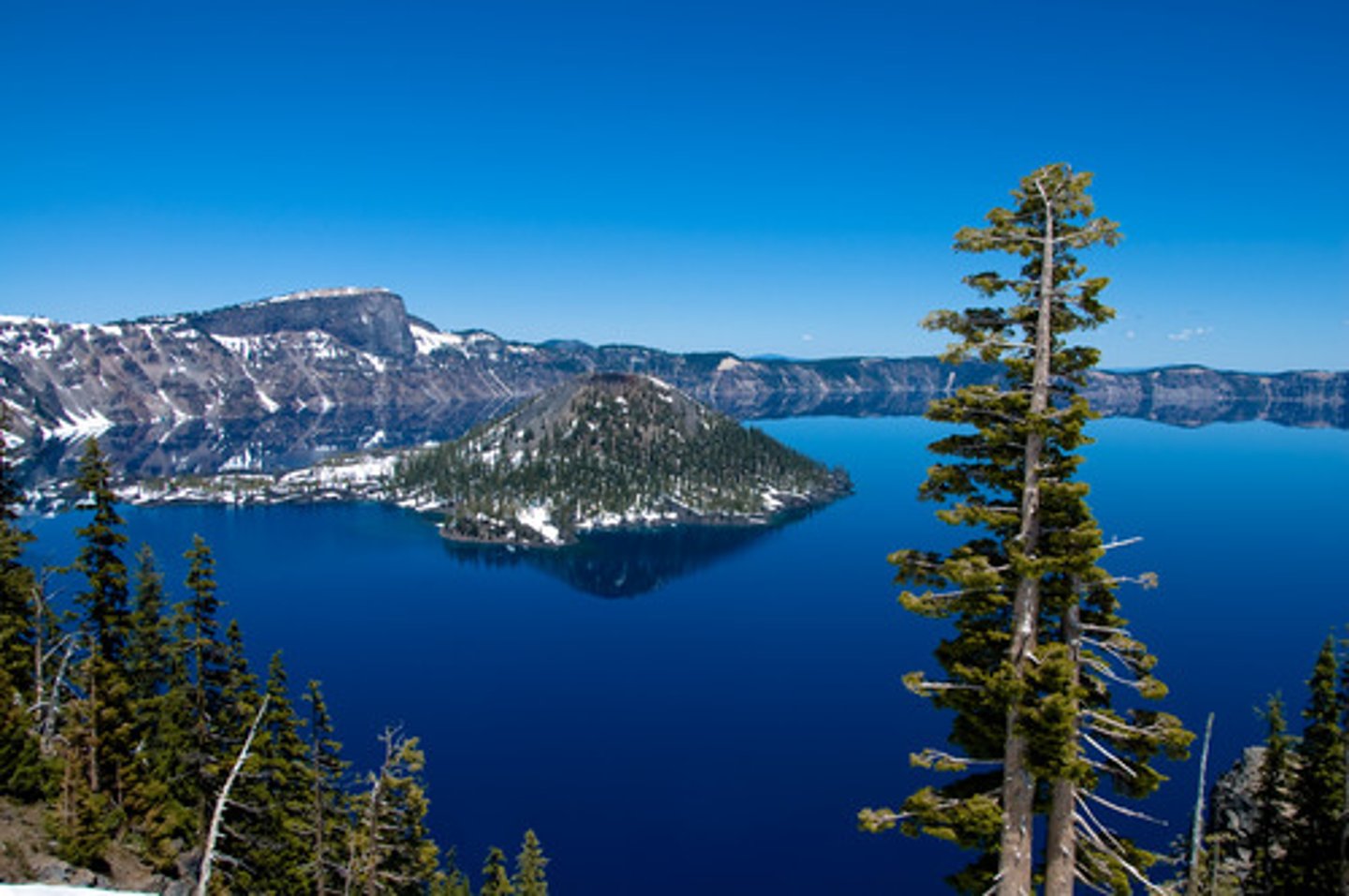 <p>a body of water surrounded by land</p>