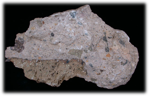 <p><span style="font-size: 12.8px; font-family: lato, sans-serif">igneous rock with pyroclastic texture &amp; mafic to felsic composition</span></p>