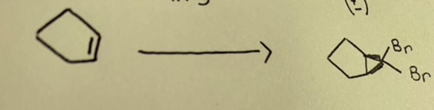 <p>double bond forms triangle, two bromines added to tip of it</p>