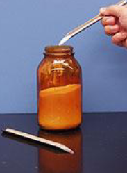 <p>Transfers solid chemicals from one container to another </p>