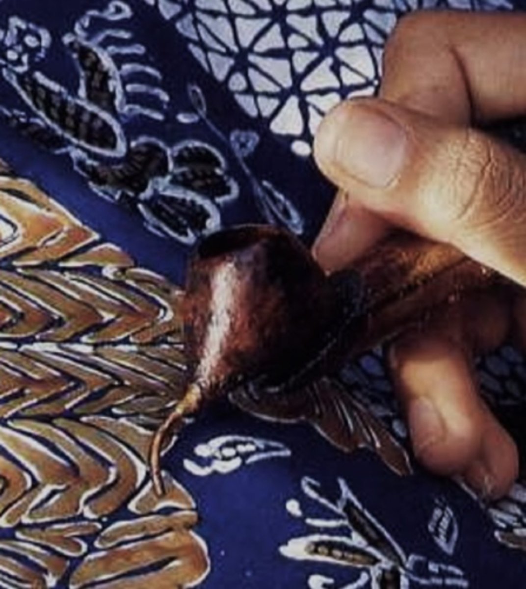 <p>tool used to draw lines in hot wax on fabric for the batik technique</p>