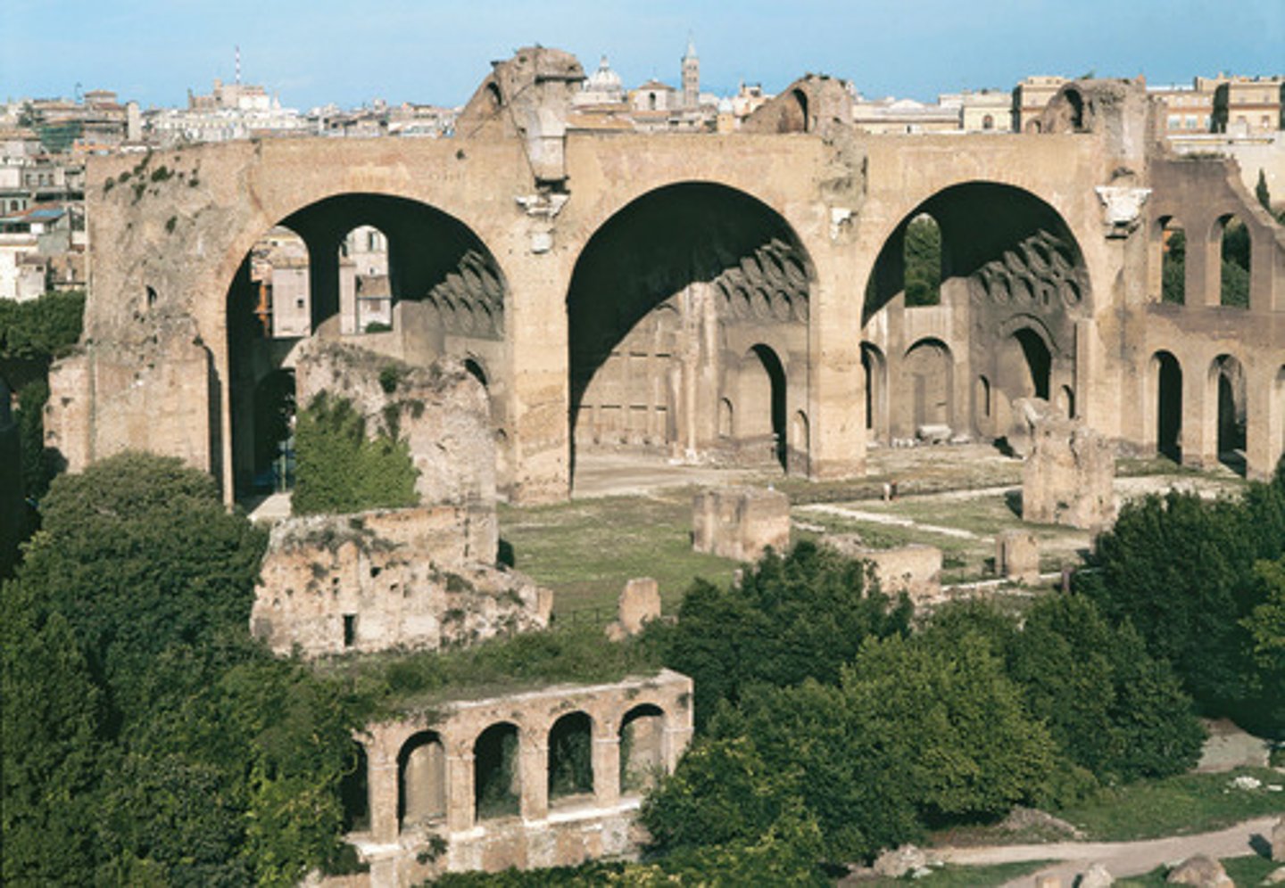 <p>in Roman architecture, a large axially planned building with a nave, side aisles, and apses</p>