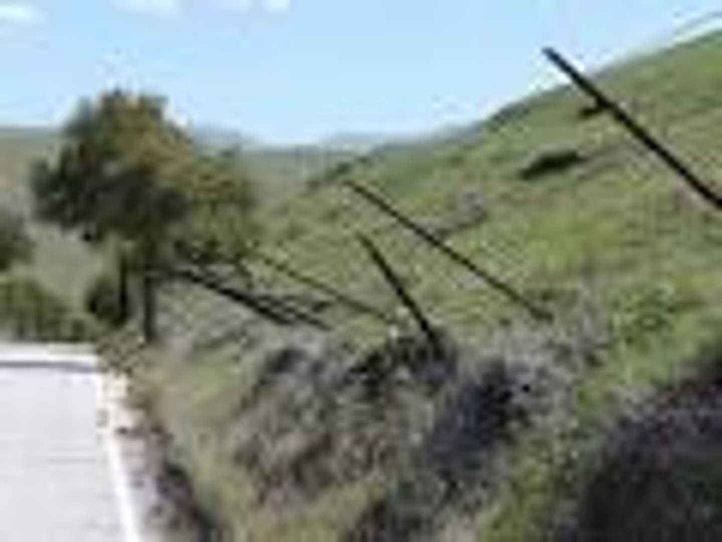 <p>the very slow downslope movement of soil and rock fragments; causes telephone poles, trees, fences, etc. to be crooked</p>