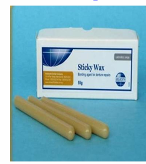 <ul><li><p>processing wax</p></li><li><p>an adhesive wax used for temporary joining of items e.g align fractures parts of acrylic denture</p></li><li><p>align fixed partial denture parts before soldering </p></li></ul><p>e.g preparatory for soldering</p>