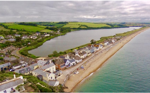 <p>Forms when a <mark data-color="green">spit grows across a bay</mark> and<mark data-color="green"> joins two headlands together.</mark></p>