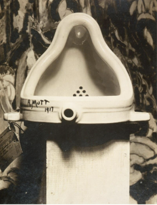<p>photo of original version, 1917 (done in the midst of WWI)</p><p>readymade glazed sanitary china with black paint</p><p>male urinal (mass produced) not high culture, making it his own art </p><p>challenged art = Dada </p>