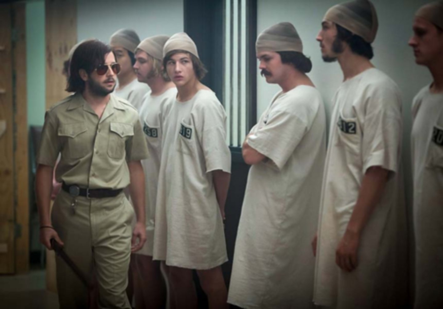 <p>A study where participants played roles of prisoners and guards, demonstrating the power of situational factors and role-playing in influencing behavior; example: Guards became abusive even though they were ordinary people outside the experiment.</p>