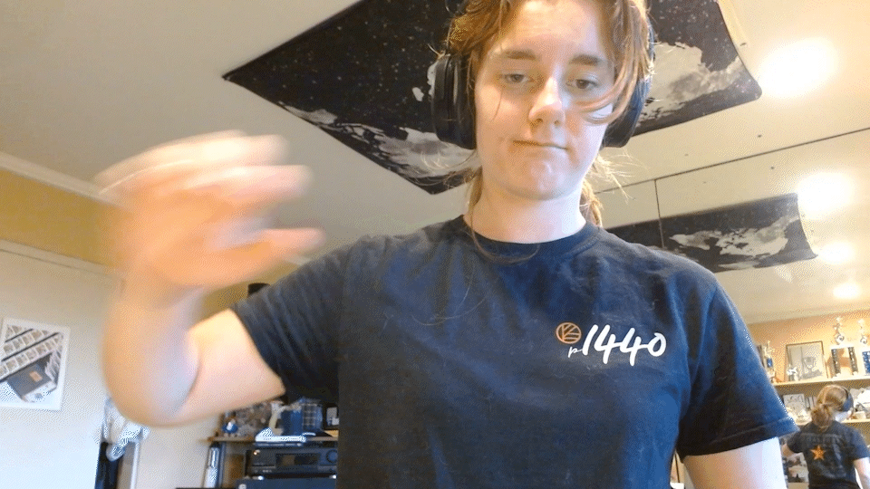 What does this sign mean? (scooping motion)