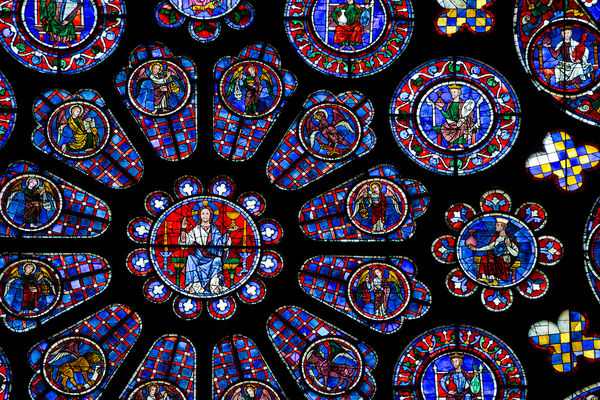 <ul><li><p>Chartres, France</p></li><li><p>c. 1145 - 1155 CE</p></li><li><p>Reconstructed c. 1194-1220 CE after a large fire</p></li><li><p>Limestone and stained glass</p></li><li><p>Jamb figures near entrance</p></li><li><p>pointed arches</p></li><li><p>utilizes old and new gothic styles</p></li><li><p>houses Virgin Mary’s Tunic</p></li></ul>