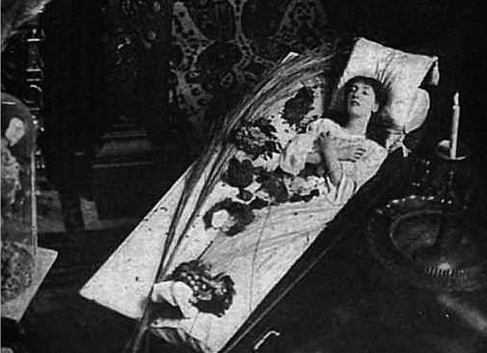 <p>Publicity Photo of Sarah Bernhardt Sleeping in Her Own Coffin</p>