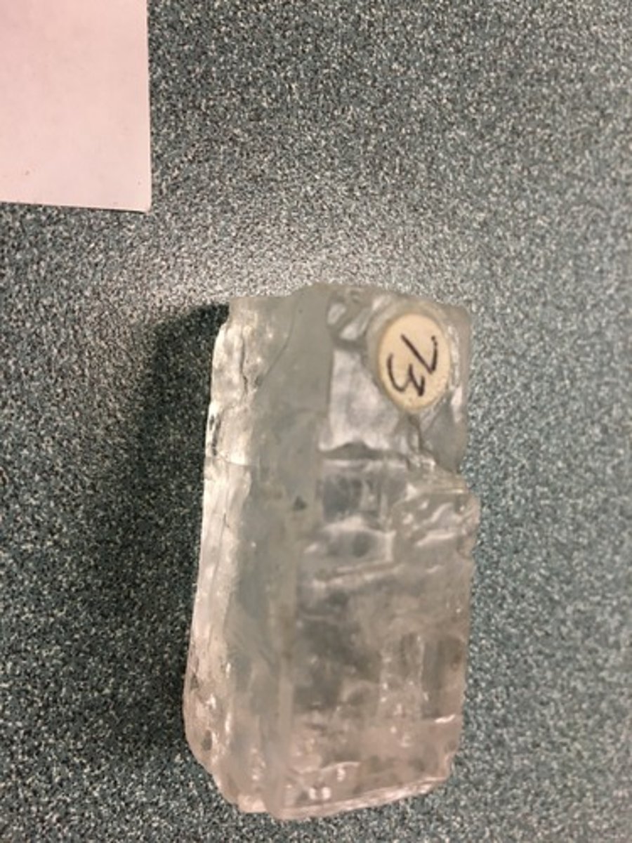 <p>glass-like, hardness of 2.5, white streak, low density</p>