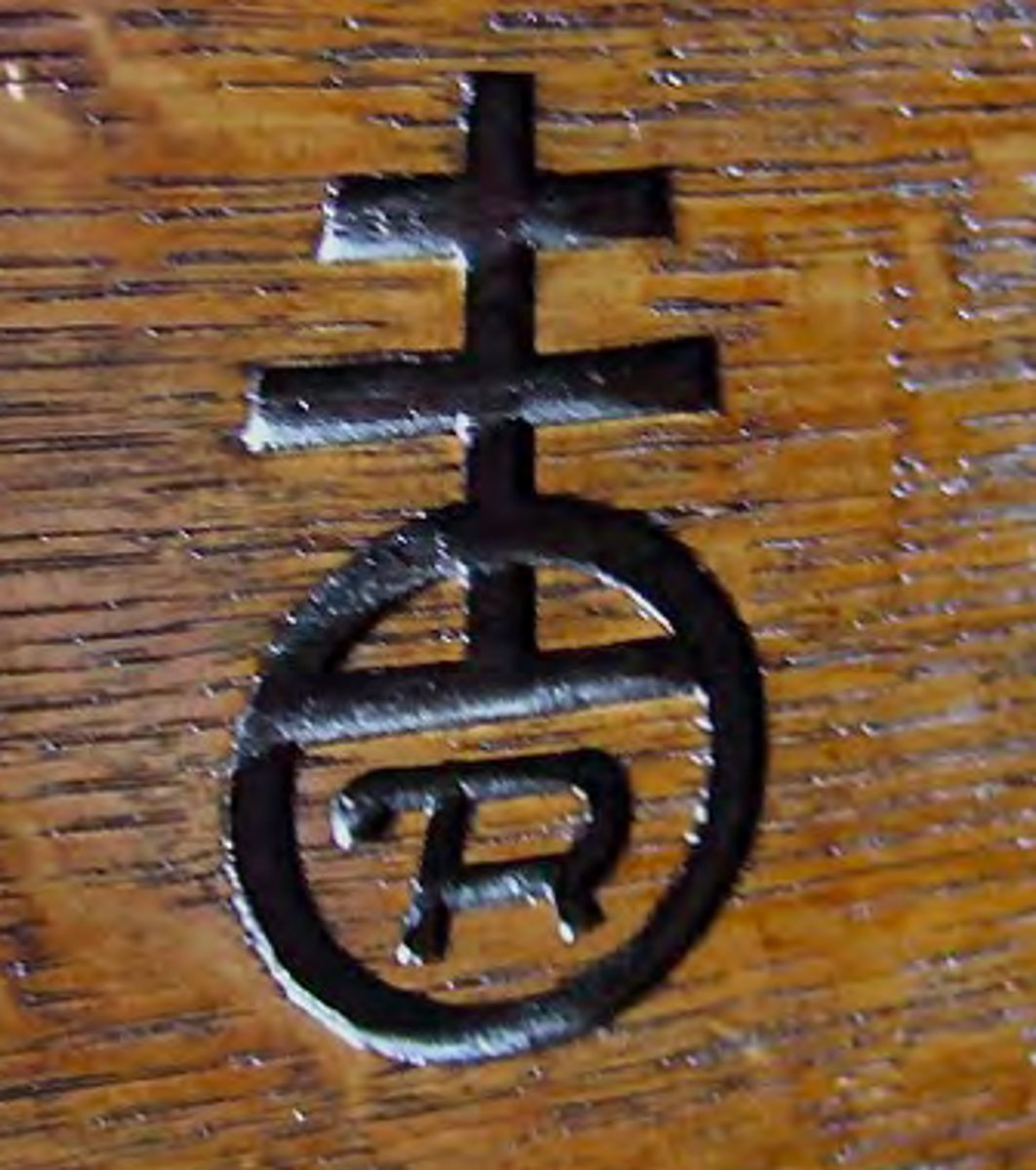 <p>branding<br>was an orb and cross<br>"the best I can do dedicated to God"<br>from illuminated manuscripts</p>