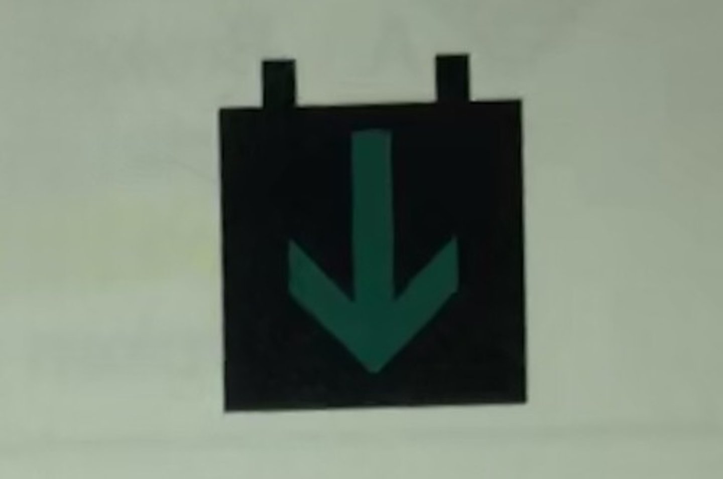 <p>This green arrow on a lane use control signal means that:</p>