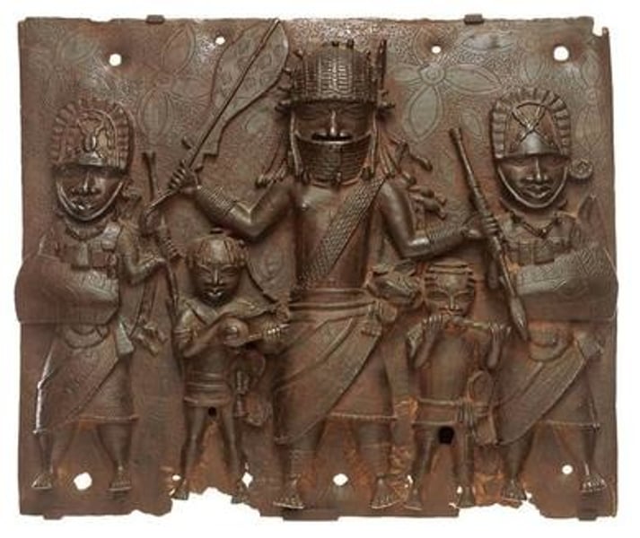 <p>plaque; Benin c. 1550-1650 CE; brass; likely nailed into surfaces of walls in palaces; hundreds of these plaques exist; African art</p>