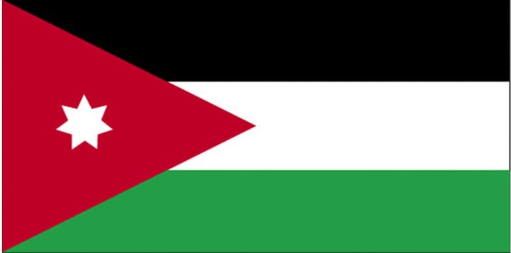 <p>Colors = the Pan-Arab colors.</p><p>Red = the Hashemite dynasty, and the Arab Revolt/bloody struggle for freedom.</p><p>White = the Umayyad Caliphate, bright and peaceful future.</p><p>Green = the Fatimid Caliphate or Rashidun Caliphate.</p><p>Black = the Abbasid Caliphate.</p><p>Seven-pointed star = the unity of the Arab people; the seven verses of Al-Fatiha and the seven hills Amman (the capital) was built on.</p>