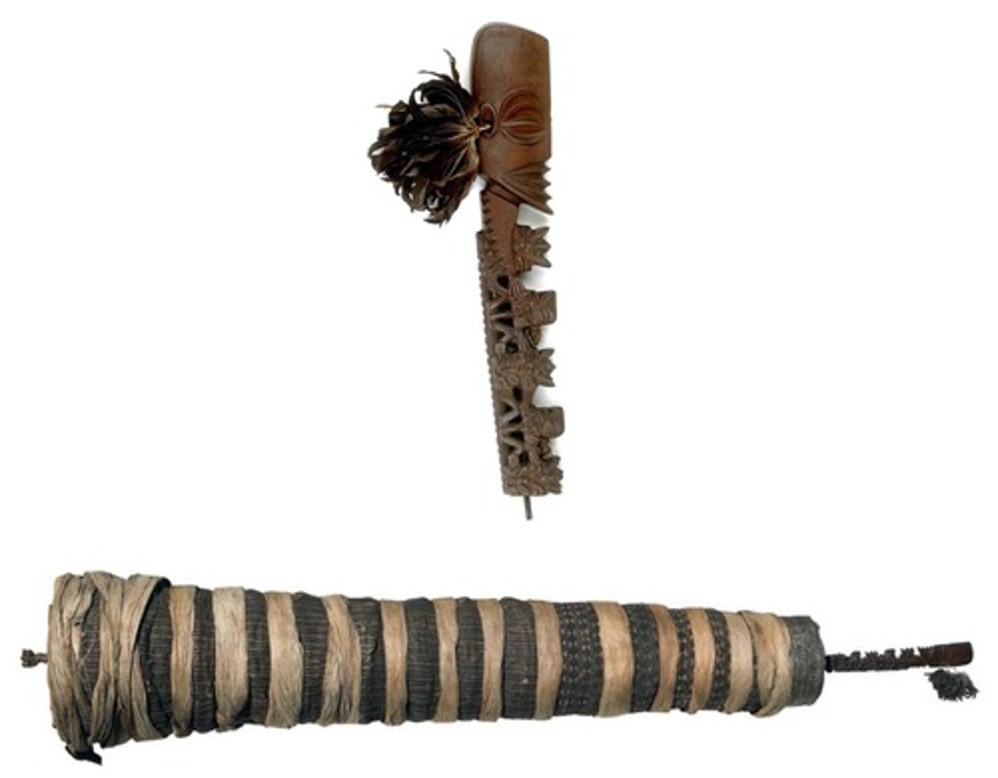 <p>Rarotonga, wood, tapa, fiber, and feathers.<br><br>Large, column wood shaft. Represented community MANA!<br>Could represent god Tangaroa (Creator god)<br>Large head on top, smaller heads below and a body shaft (wrapped in tapa) that turns into a penis<br>Tapa fibers wrap/clothe the staff god and pearls/amulets.<br>Women make the tapa, men carve. MEN AND WOMEN WORK TOGETHER!!!<br><br>Many staff gods were broken, especially by missionaries</p>