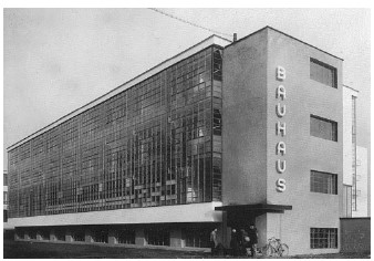 <p>The Bauhaus building's facade is characterized by a curtain wall that contrasts with the concrete elements, emphasizing transparency and modernity.</p>