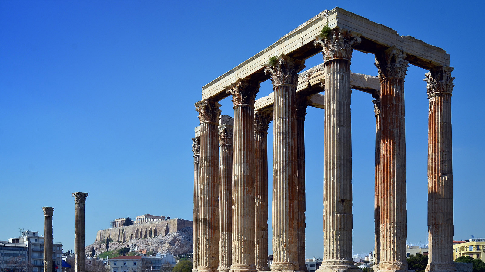 <p>Limestone covered in stucco = looks like marble</p>