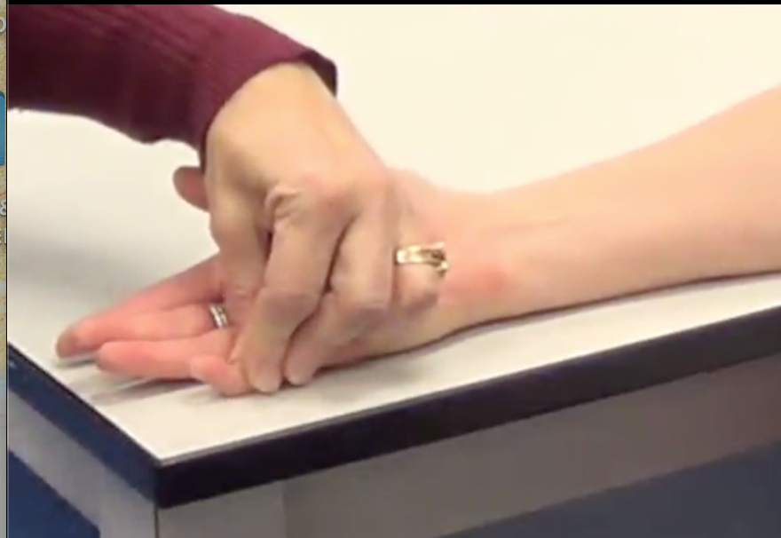 "Relax your fingers, can you bend the tip of your finger for me?"