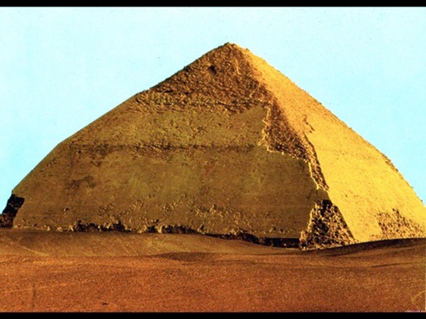 <p>An Egyptian pyramid-type in which each triangular planar surface changes direction as it approaches the top. Also called the Blunt or False Pyramid.</p>