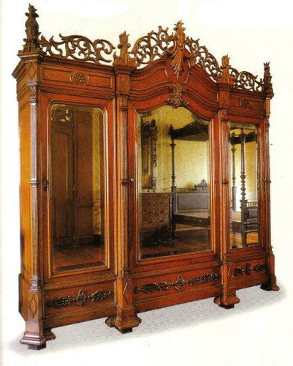 <p>"Three - Moons";</p><p>Clothes cabinet with mirror on each of its three doors</p>