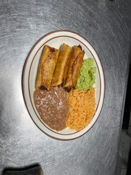 <p>Three tightly rolled deep fried corn tortillas. filled with chicken. served with guacamole, refried beans, and rice.</p>