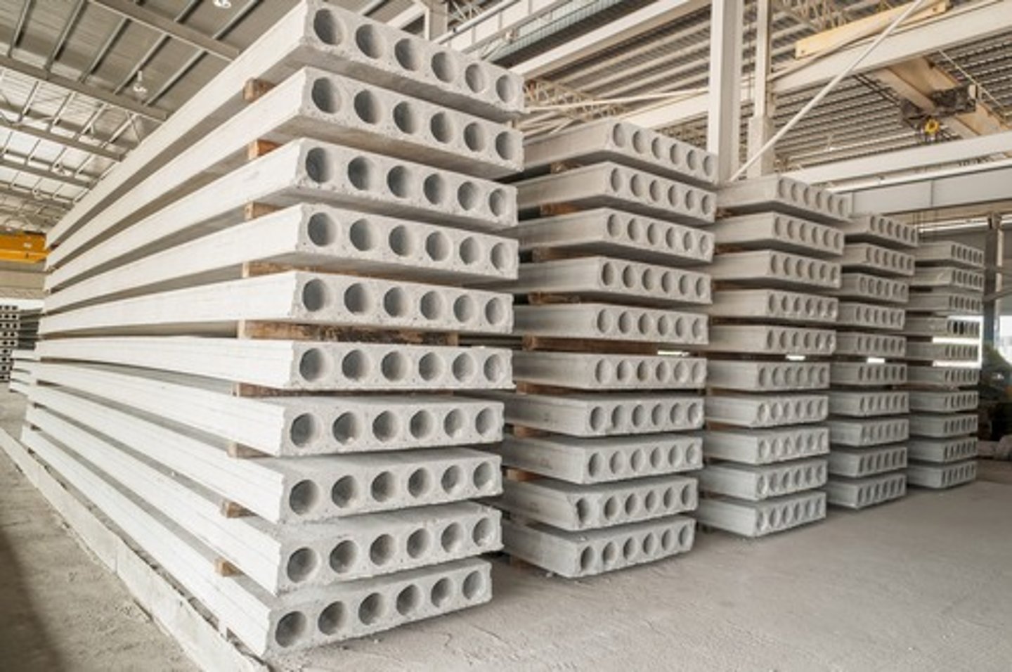 <p>A concrete slab member or product that is cast and cured in a place other than where it is to be installed in a structure</p>